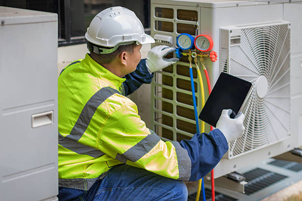Professional Air Duct Cleaning technician working in Quinebaug, CT